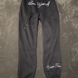 Yours Truly “love yourself” black joggers in size XL